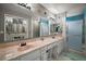 Spacious bathroom with double sinks, ample counter space, and a separate shower area at 612 Heron Bay Dr, Orlando, FL 32825