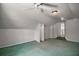 Bright bonus room with ceiling fans, access to another room, and extra storage space at 612 Heron Bay Dr, Orlando, FL 32825