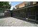 View of covered and screened lanai featuring paver flooring and a dog door at 612 Heron Bay Dr, Orlando, FL 32825
