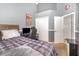 This bedroom features a gaming setup, as well as a tall ceiling and large closet at 637 Blenheim Loop, Winter Springs, FL 32708