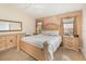 Comfortable main bedroom with carpet flooring, textured accent wall, and a spacious interior at 637 Blenheim Loop, Winter Springs, FL 32708