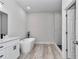 This bathroom has a soaking tub, a walk-in shower, and double sinks at 6691 Sw 151Sr Loop, Ocala, FL 34473