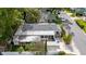 Overhead view of home's layout highlighting the patio, and proximity to neighboring properties at 674 Douglas Ave, Winter Park, FL 32789