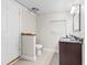 Simple bathroom with a vanity and a toilet separate from the sink and vanity area at 674 Douglas Ave, Winter Park, FL 32789