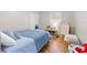 Cozy bedroom featuring tile floors, a playful learning center, and a cheerful blue-and-white color scheme at 674 Douglas Ave, Winter Park, FL 32789