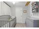 A soothing Bedroom features a gray color palette and ample storage for convenience at 674 Douglas Ave, Winter Park, FL 32789