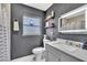 Bathroom boasts modern fixtures, stylish vanity, and well-lit mirror at 7033 Budapest Way, Orlando, FL 32822