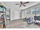 Bonus room area with lots of natural light and access to a closet at 7033 Budapest Way, Orlando, FL 32822