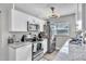 Modern kitchen with white cabinets, stainless steel appliances, and stylish countertops at 7033 Budapest Way, Orlando, FL 32822