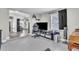 Open concept living room space with tile floors and lots of natural light at 7033 Budapest Way, Orlando, FL 32822