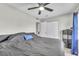 Comfortable main bedroom features ceiling fan and closet at 7033 Budapest Way, Orlando, FL 32822
