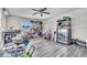 Spacious storage room with vinyl floors, large window and ceiling fan at 7033 Budapest Way, Orlando, FL 32822