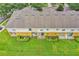 Aerial view of the townhome highlighting its backyard space, well-kept lawn, and overall community layout at 707 N Marotta Loop, Ocoee, FL 34761
