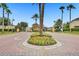 Inviting gated community entrance with lush landscaping and secure access at 707 N Marotta Loop, Ocoee, FL 34761