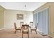 Bright dining area with modern pendant lighting and large windows at 707 N Marotta Loop, Ocoee, FL 34761