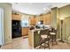 Efficient kitchen with ample cabinet space and modern appliances at 707 N Marotta Loop, Ocoee, FL 34761