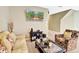 Comfortable living room features stylish furnishings and neutral decor throughout at 707 N Marotta Loop, Ocoee, FL 34761