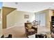 Spacious living room showcasing a dining area, with ample natural light and comfortable seating at 707 N Marotta Loop, Ocoee, FL 34761