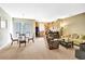 Inviting open-concept living and dining area, perfect for entertaining and comfortable living at 707 N Marotta Loop, Ocoee, FL 34761