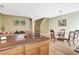 Open-concept living space combining kitchen, dining, and living areas at 707 N Marotta Loop, Ocoee, FL 34761