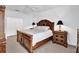 Spacious main bedroom featuring a ceiling fan and a decorative wooden furniture set at 707 N Marotta Loop, Ocoee, FL 34761