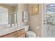 Bathroom with a sink, vanity, and shower, offering a clean and functional space for personal care at 724 Duff Dr, Winter Garden, FL 34787