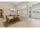 Bright and airy dining room with tile flooring and outdoor views at 724 Duff Dr, Winter Garden, FL 34787