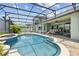 Backyard pool and patio area with screened enclosure for an inviting outdoor entertainment space at 724 Duff Dr, Winter Garden, FL 34787