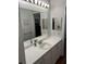 Bright bathroom with modern lighting, a spacious countertop, and a clean, inviting atmosphere at 816 Polo Park East Blvd, Davenport, FL 33897