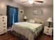 This bedroom features hardwood floors, neutral paint, and coordinated nightstands and dresser at 816 Polo Park East Blvd, Davenport, FL 33897