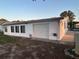 This home features a single garage and multiple windows providing lots of light at 816 Polo Park East Blvd, Davenport, FL 33897