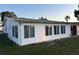 This home features multiple windows providing lots of light and access to the garage at 816 Polo Park East Blvd, Davenport, FL 33897