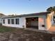 This home features a single garage with shelving at 816 Polo Park East Blvd, Davenport, FL 33897