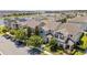 Aerial view showing the beautiful surrounding neighborhood with nearby pond at 8160 Iron Mountain Trl, Windermere, FL 34786