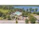 Gorgeous community pool and playground near a lake and parking at 8160 Iron Mountain Trl, Windermere, FL 34786