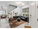 Cozy living room features stylish decor, modern lighting, and comfortable seating at 8160 Iron Mountain Trl, Windermere, FL 34786