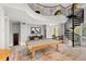 Community game room featuring a pool table, spiral staircase, and comfortable seating with tables and chairs at 860 N Orange Ave # 323, Orlando, FL 32801
