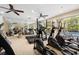 Fitness center featuring elliptical machines, treadmills, and mirrors with views to pool and patio at 860 N Orange Ave # 323, Orlando, FL 32801