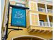 Park North at Cheney Place sign at 860 North Orange Avenue displayed on the side of a yellow condo building at 860 N Orange Ave # 323, Orlando, FL 32801