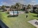 This screened in balcony has views of the pool and common area at 9831 Barley Club Dr # 8, Orlando, FL 32837