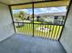 Screened in balcony with views of a pool at 9831 Barley Club Dr # 8, Orlando, FL 32837
