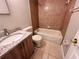Cozy bathroom featuring granite vanity and tiled shower/tub combination at 9831 Barley Club Dr # 8, Orlando, FL 32837