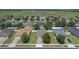 An aerial view of the home within its neighborhood shows the property boundaries and community feel at 10138 Lenox St, Clermont, FL 34711