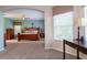 Spacious main bedroom features an archway and sitting area at 1161 Coastal Cir, Ocoee, FL 34761