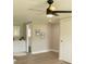 Bright bathroom features a modern vanity, updated light fixture, and decorative wall art at 1220 Dustin Dr, Lady Lake, FL 32159