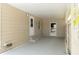 Convenient carport with dual entry doors, providing sheltered parking and easy access to the home at 1220 Dustin Dr, Lady Lake, FL 32159