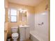 Bathroom featuring a shower and tub combination and cabinet and vanity at 1244 Woodland Ave, Lakeland, FL 33801