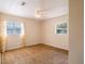Bedroom with carpet flooring and natural light streaming through the windows at 1244 Woodland Ave, Lakeland, FL 33801