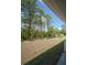 Expansive backyard featuring trees and a gentle slope at 13420 Sw 77Th Ave, Ocala, FL 34473