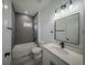Bright bathroom featuring modern fixtures, a shower-tub combination, and updated vanity at 13420 Sw 77Th Ave, Ocala, FL 34473